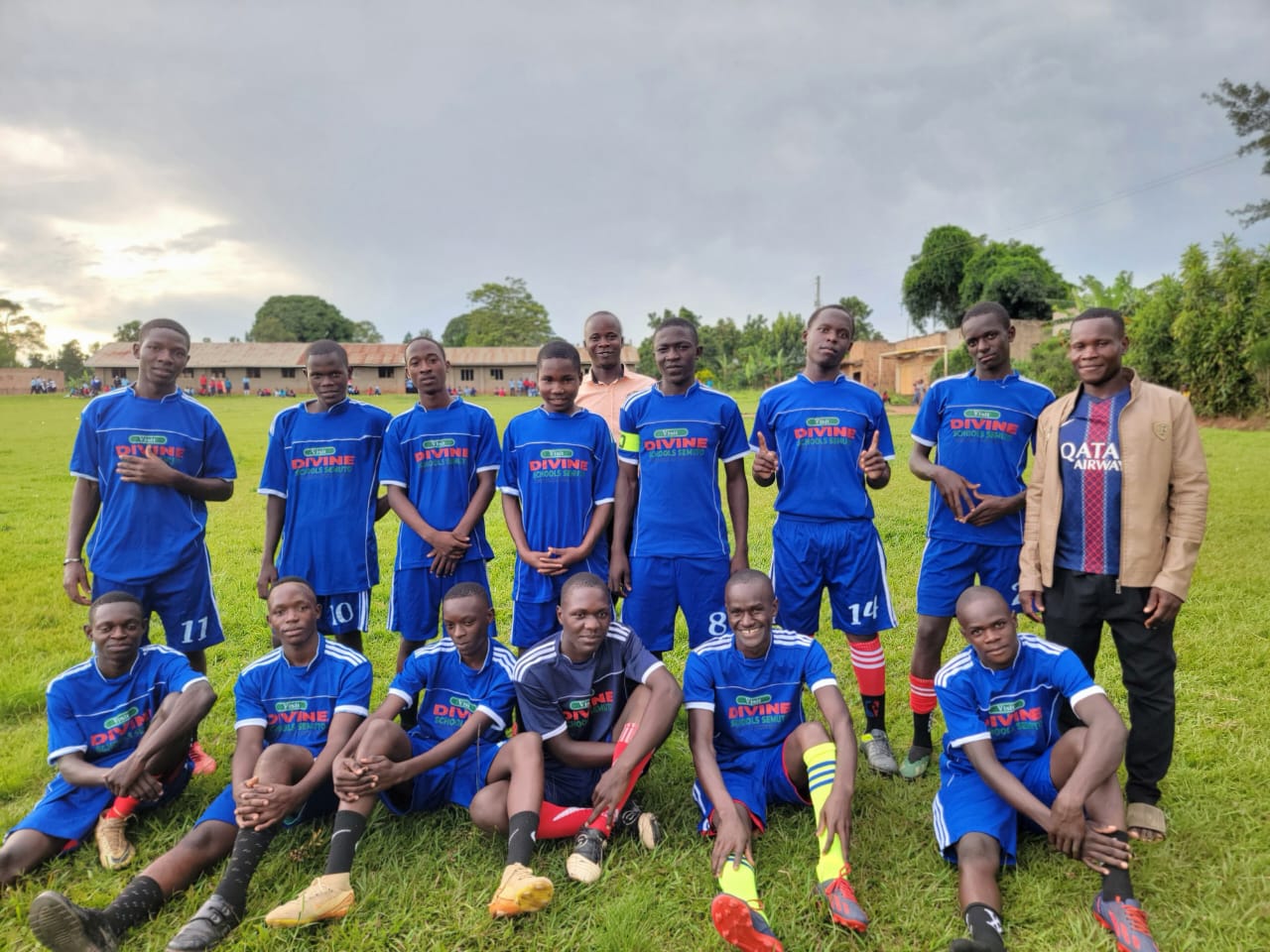 Divine Care footballers celebrating after a match