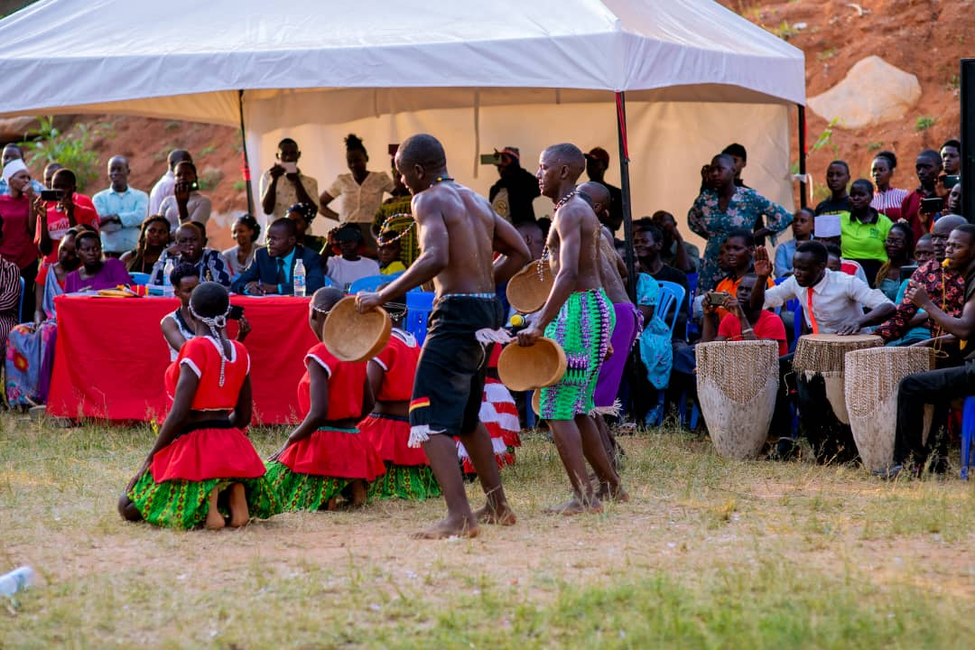 Dancers and drummers performing at a Divine Care school function