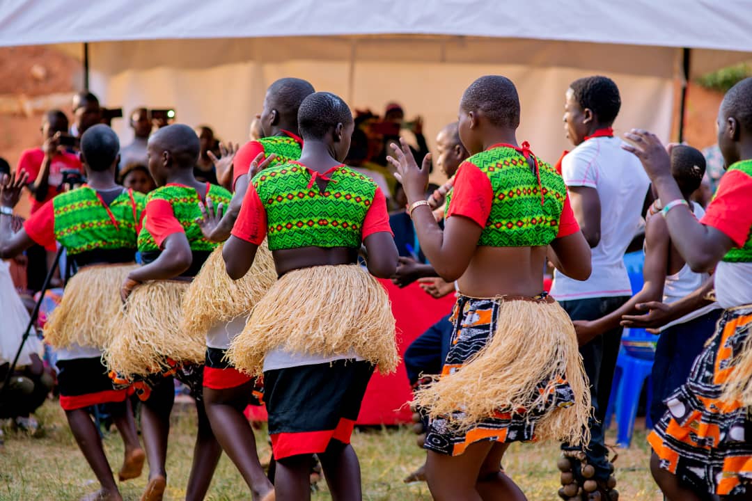 Divine Care students performing a traditional dance in full costume