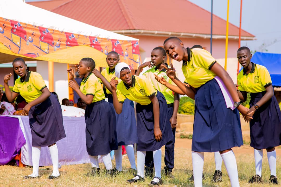 Divine Care students performing a drama piece at a school event