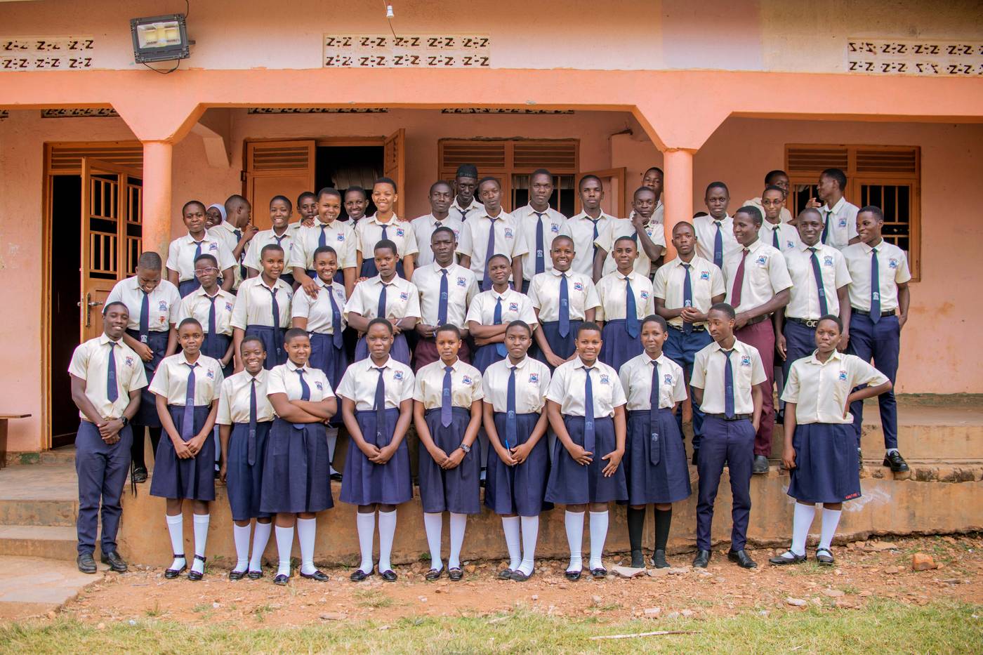 Divine Care girls posing in school uniform